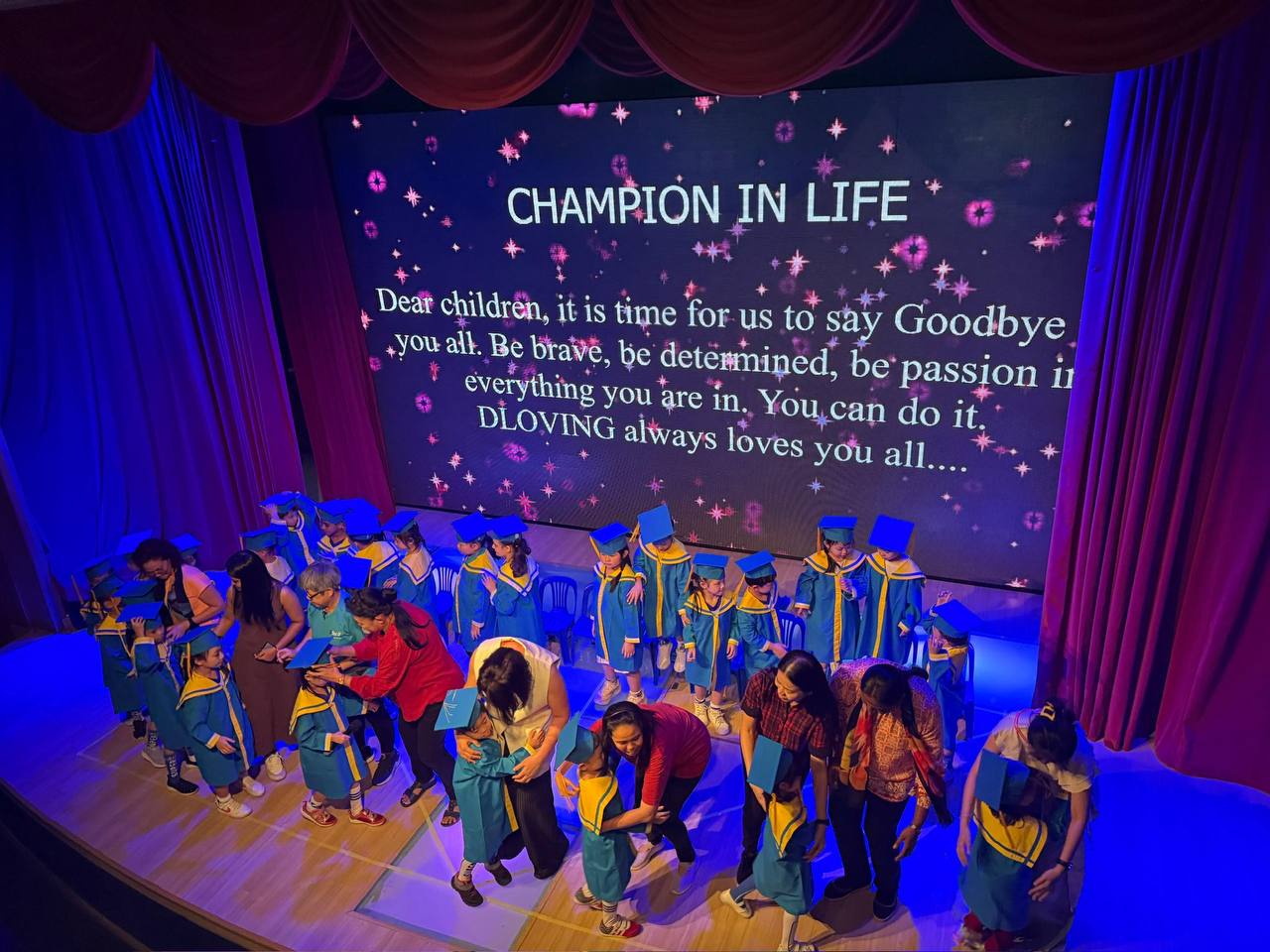 Dloving children and families celebrating graduation together