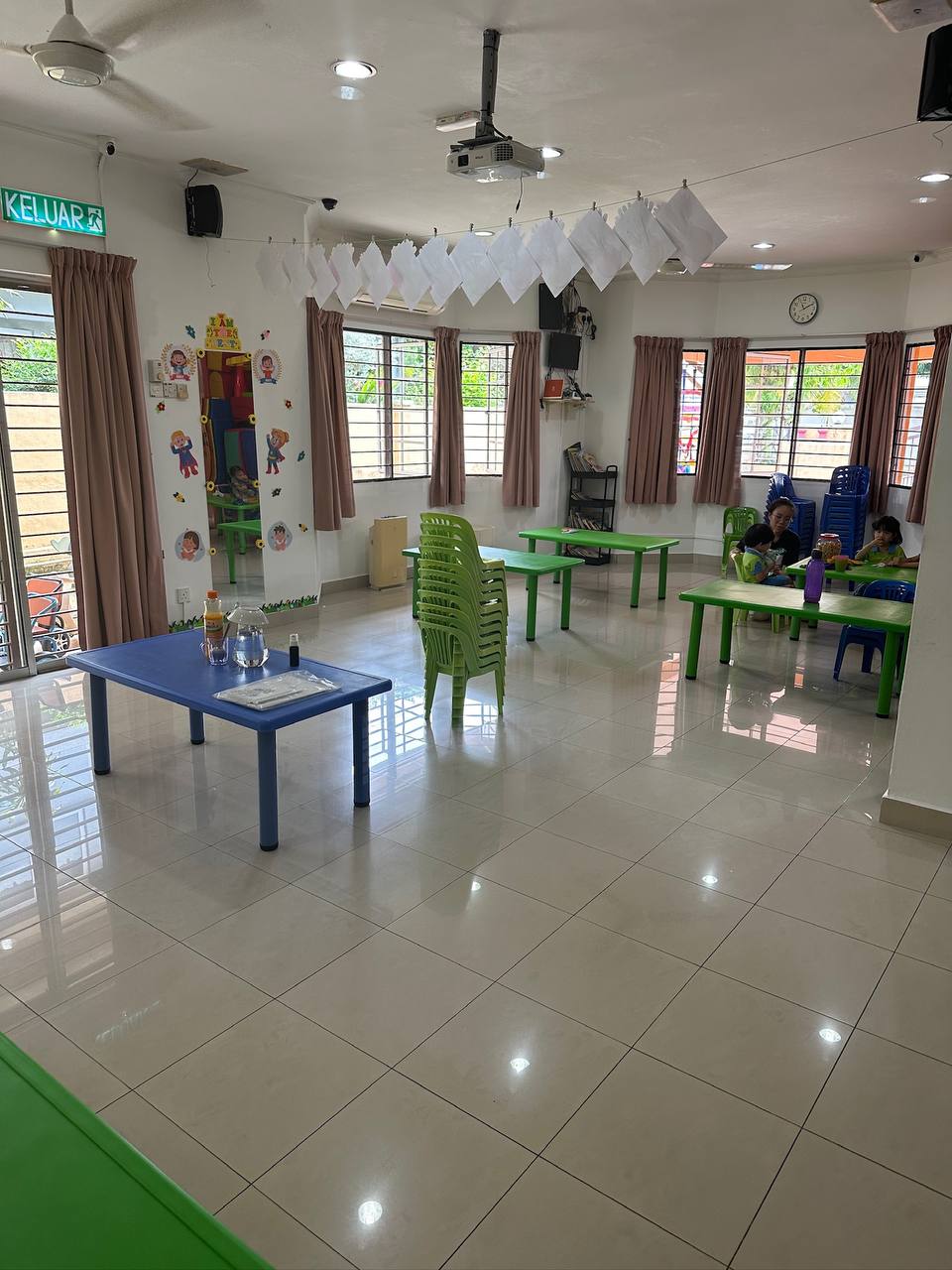 The bright main activity room at Dloving